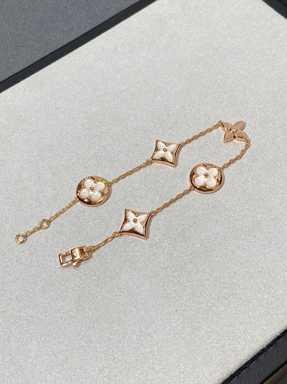 [⭐Spark]STAR AND SUN 5 MOTIF MOP PINK GOLD BRACELET