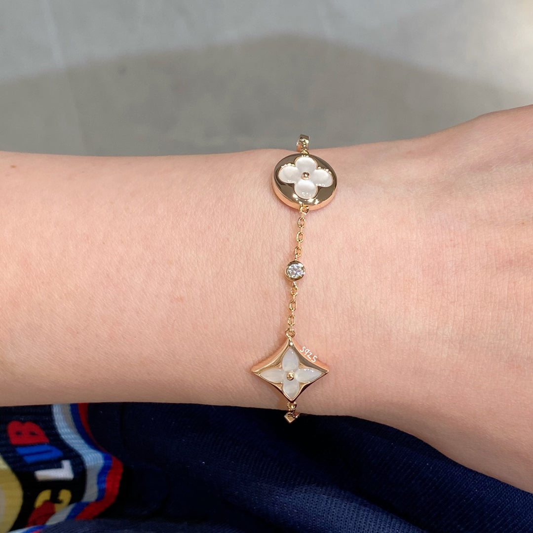 [⭐Spark]STAR AND SUN 4 MOTIF WHITE MOP PINK GOLD BRACELET