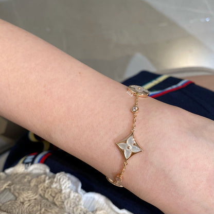 [⭐Spark]STAR AND SUN 4 MOTIF WHITE MOP PINK GOLD BRACELET