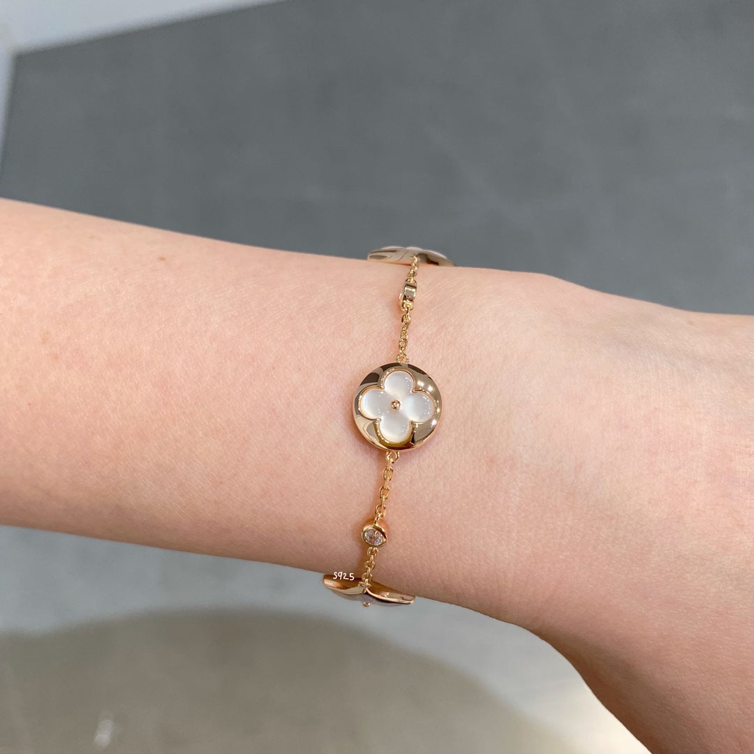 [⭐Spark]STAR AND SUN 4 MOTIF WHITE MOP PINK GOLD BRACELET