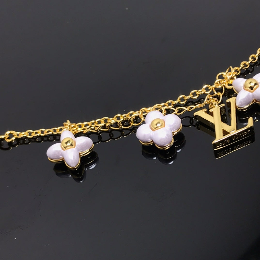 [⭐Spark]LOGO 6 MOTIF STAR AND SUN GOLD BRACELET